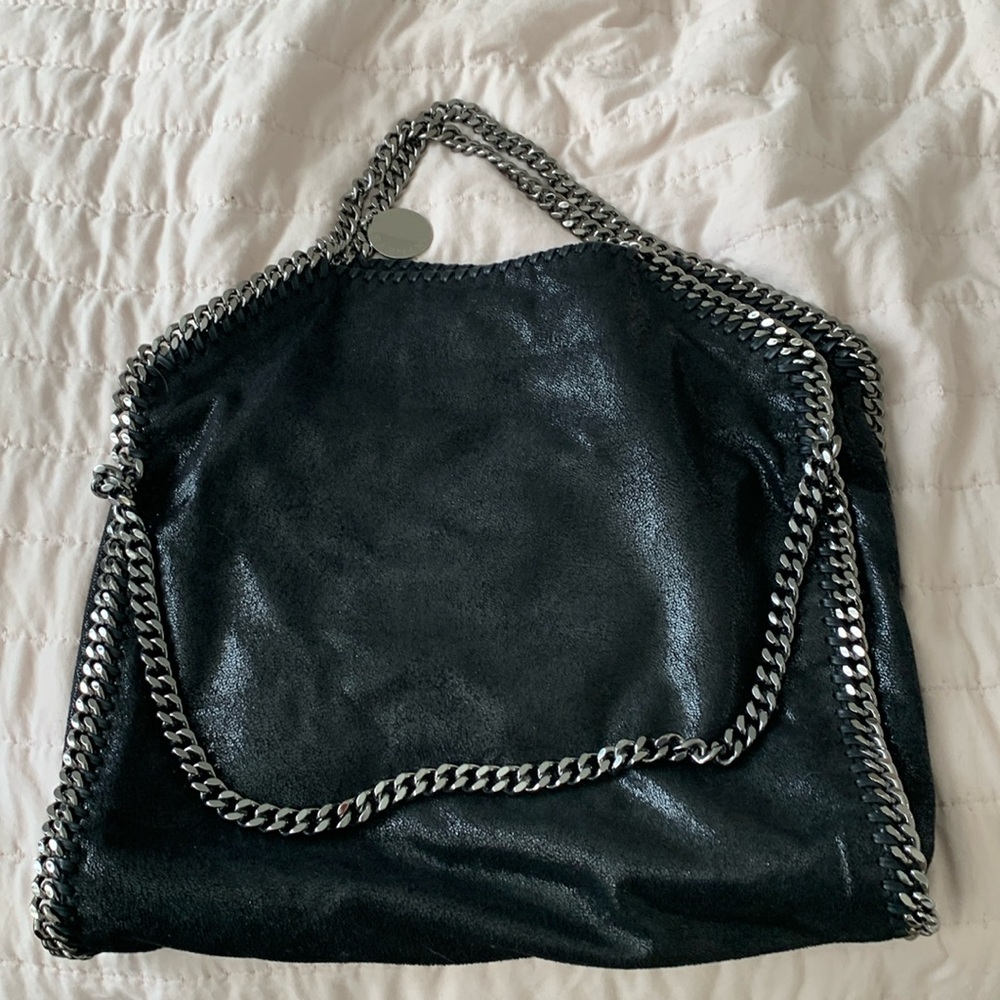 Barely used. Black w/slight shimmer. Falabella Shaggy Deer Faux leather foldover